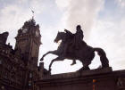 The Balmoral Hotel and the statue of the Duke of Wellington, from the steps of Register House, September 2002