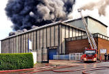 Fire Engine attending the fire at Bruce Peebles' works  -  12 April 1999