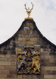 Canongate Church in Edinburgh's Royal Mile  -  Zoom in to Cross and Antlers (upper centre)