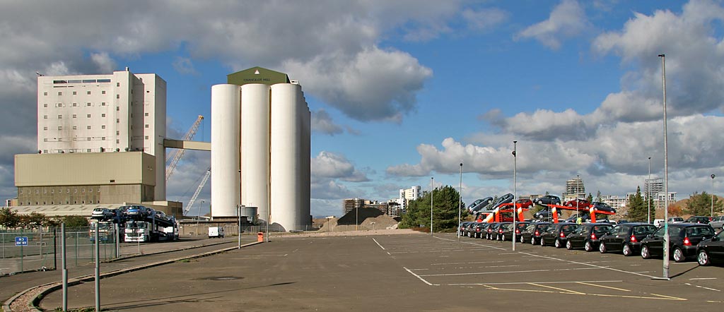 Chancelot Mill beside Leith Western Harbour, and imported cars  -  Septemeber 2005