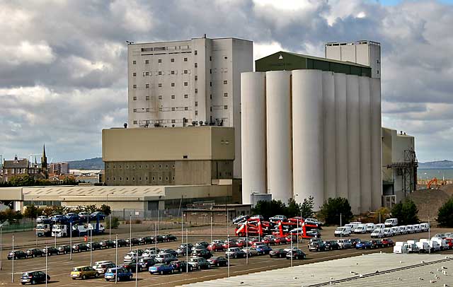 Chancelot Mill beside Leith Western Harbour, and imported cars  -  Septemeber 2005