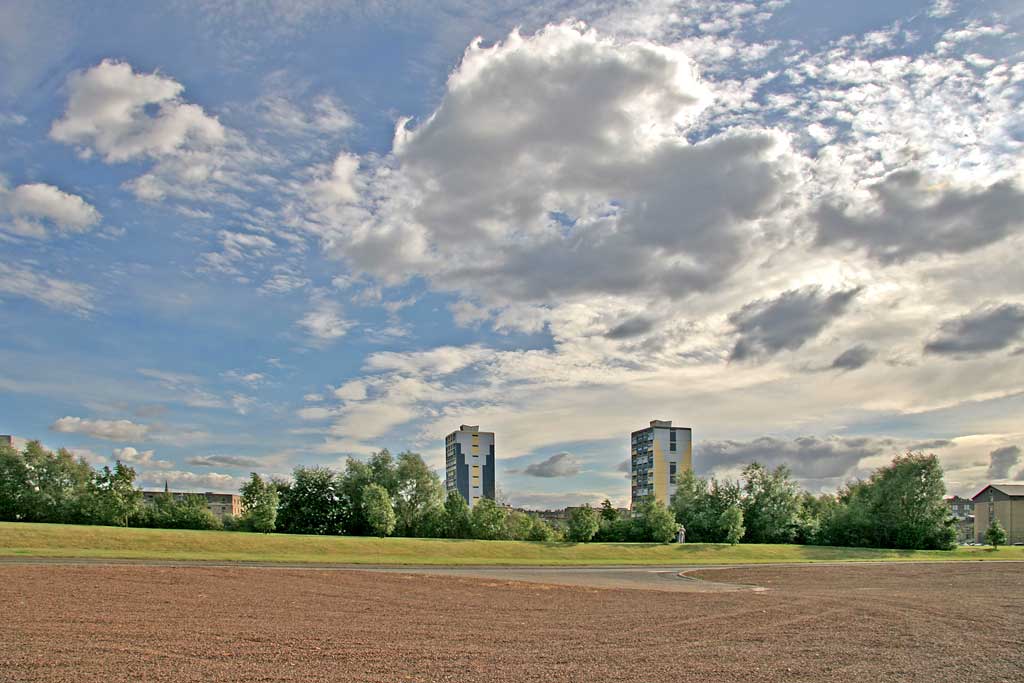 Looking to the south from open gorund in front of Ocean Terminal to Citadel Court and Persevere Court, near Great Junction Street, Leith