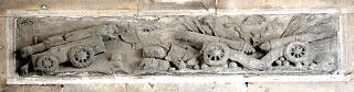 One of two carved stone panels high on the wall at the gatehouse to Edinburgh Castle