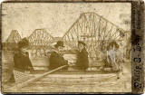 Cabinet Print by Philip E Low, of a group in a studio boat in front of a backdrop of the Forth Bridge