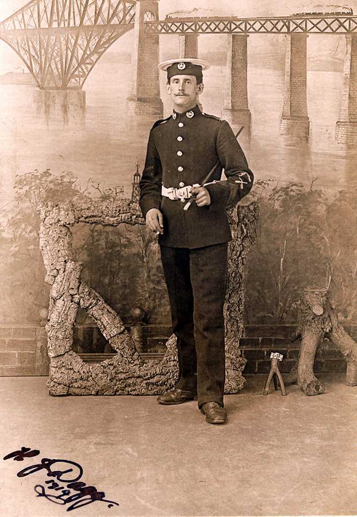 Cabinet Print of H J Dagg, with a backdrop of the Forth Bridge and two trains, taken in Peter McGill's studio at Queensferry