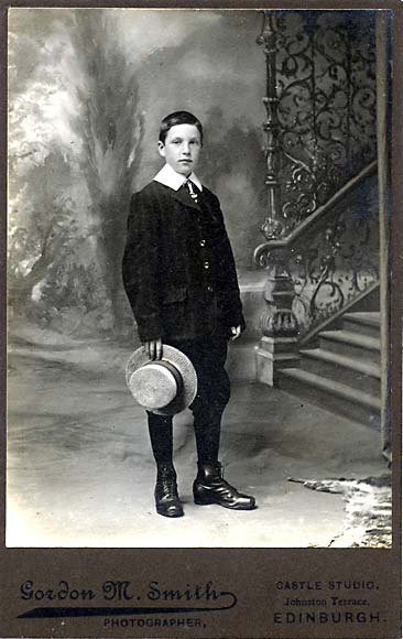 The back of a cabinet print by Gordon M Smith  -  Boy with Hat