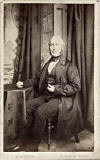  A carte de visite by John Horsburgh  from studio at 17 Princes Street  -  man at table