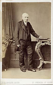 A carte de visite by John Horsburgh  -  Elderly man and table