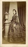 A carte de visite by the Edinburgh professional photographer John Ross  -  lady and handbag