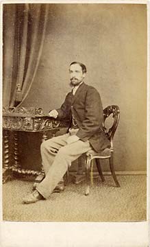 A carte de visite by the Edinburgh professional photographer John Ross   -  from his studio at 36 North Hanover Street  -  man on a chair