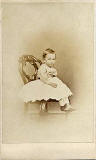 A carte de visite by the Edinburgh professional photographer John Ross  -  from his studio at 5 Lothian Road  -  Child on a chair