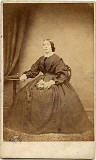 A carte de visite by the Edinburgh professional photographer John Ross  -  lady with large dress