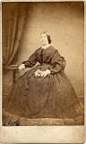 A carte de visite by the Edinburgh professional photographer John Ross  -  lady with large dress