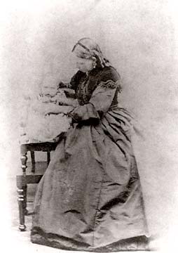 Carte de visite from the studio of Scott & Oman  -  Mary Ann Oman, photographed with one of her children, probably Jemima