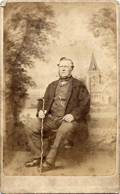 Stewart & Oman  -  Carte de Visite of a man with a stick, seated