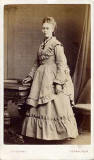 A carte de visiet by James Good Tunny  -  1871-1874  -  Lady and Curtain