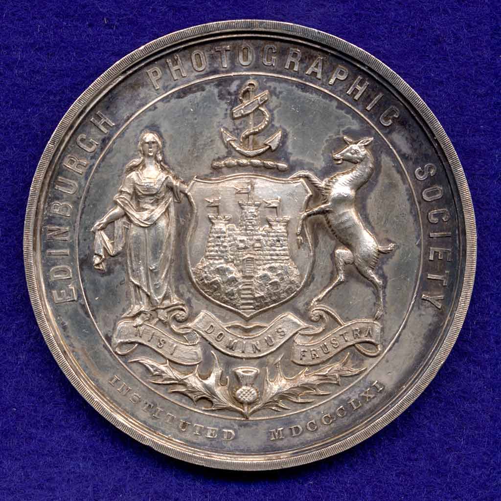 The front of a Silver Medal awarded by Edinburgh Photographic Society to J B Johnstone in 1896