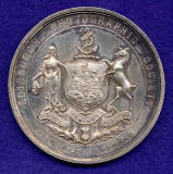 The front of a Silver Medal awarded by Edinburgh Photographic Society to J B Johnstone in 1896