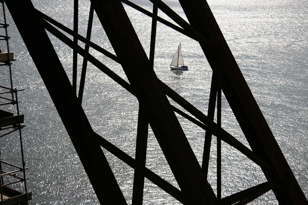 Looking down from the Forth Bridge  -  A yacht close to South Queensferry.
