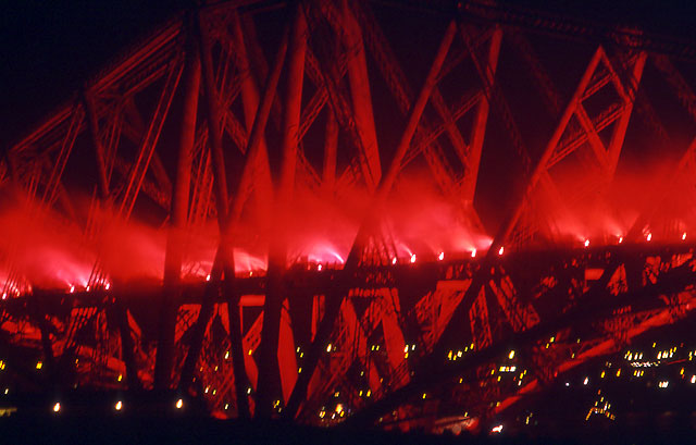 The Forth Rail Bridge, floodlit with fireworks  for the Centenary Celebrations in 1990