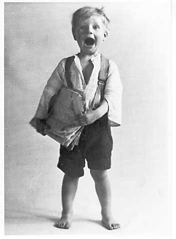 Photograph by AH MacLucas of his son Norman- Paper Seller 2