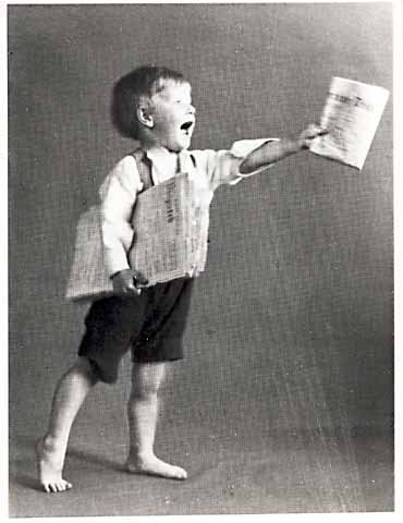 Photograph by AH MacLucas of his son Norman - paper seller 1