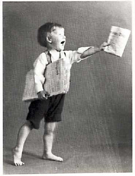 Photograph by AH MacLucas of his son Norman - paper seller 1