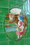 Tiles in a Buttercup Dairy Co shop, based on a painting by Tom Curr