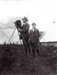 Ediinburgh Professional Photographers  -  John Drummond at military camp with his camera and his son, Ian