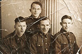 Four  brothers, all members of the Royal Scots, taken at Jerome's Studio, 79 Leith Street, in 1939