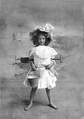 Photograph of a girl (name not known) in Claude Low's studio