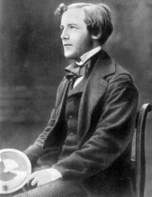 James Clerk Maxwell as a young man; holding his top, showing how colours can be mixed to give white