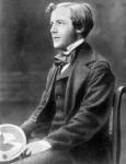 James Clerk Maxwell as a young man; holding his top, showing how colours can be mixed to give white