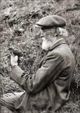 Charles Reid with a young cuckoo