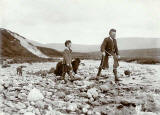 Photograph from the family of Horatio Ross  -  Hunting and Shooting in the Scottish Highlands  -  Man, boy and dog