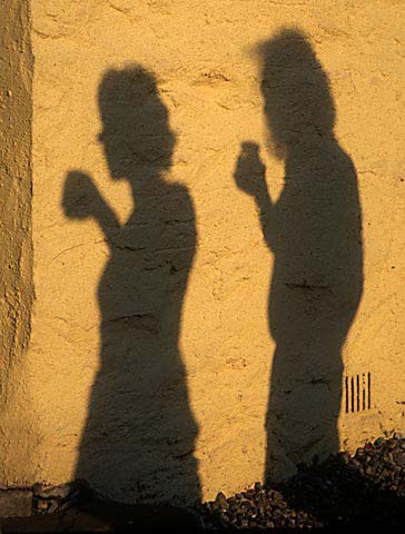 Shadows of Sue Hill and Dougie Hamilton  -  photographed at the Evening Dinner following the judging of the EPS International Exhibition in 1995.