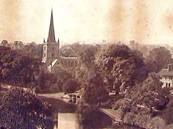 Zoom-in to an A W Elson Photograph - river and church - Where is it?