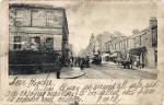 Postcard by J K Home Crawford  -  Looking along Portobello High Street from its junction with Brighton Place