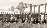 K Ltd Postcard  -  A large group of men and ladies in front of the Forth Rail Bridge