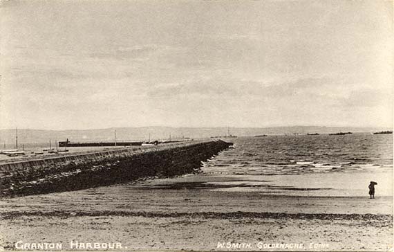 Postcard by W Smith, Goldenacre, Edinburgh, titled Granton Harbour  -  showing Granton Breakwater and Beach
