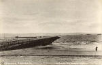 Postcard by W Smith, Goldenacre, Edinburgh, titled Granton Harbour  -  showing Granton Breakwater and Beach