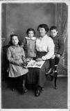 Postcard portrait by Colin Campbell, 31 Princes Street, Edinburgh  -  Evelyn Hunt's family around 1919