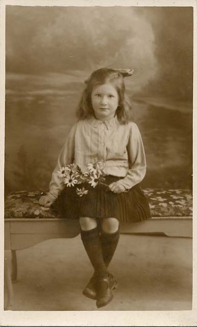 Jerome postcard  -  1932  -  Girl with Flowers