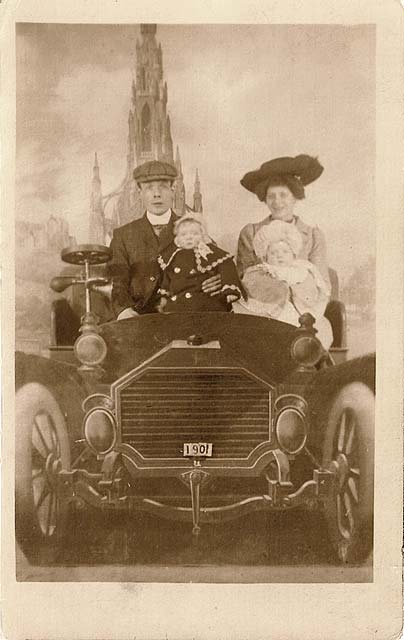 Postcard portrait with a studio car and backdrop by Claude Low