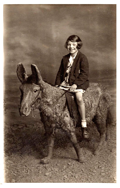 Photo from the studio of Robert McLelland  -  Girl on a Stuffed Donkey