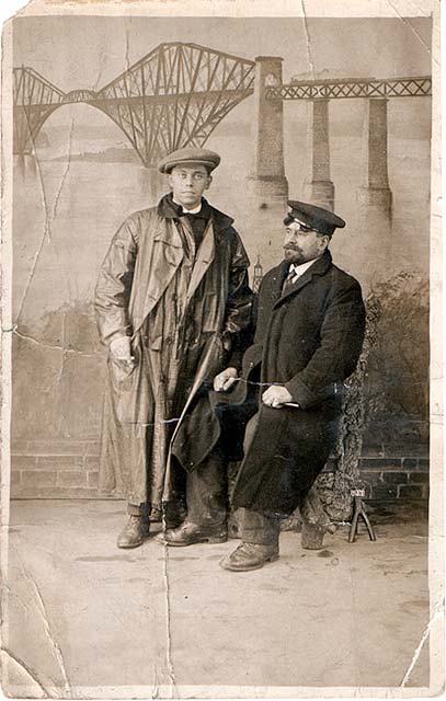 Studio Portrait of two men with a backdrop of the Forth Bridge