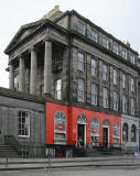 Blenheim Place at the west end of Royal Terrace  -  Dofos Pet Shop and the Royal Bank of Scotland