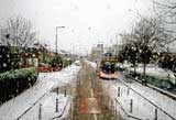 Looking to the west along Boswall Parkway in the snow, from the top deck of a No 19 bus