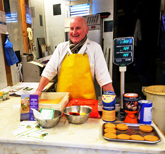 Mr Bee at his counter inside 'Something Fishy' at 16a, Broughton Street.