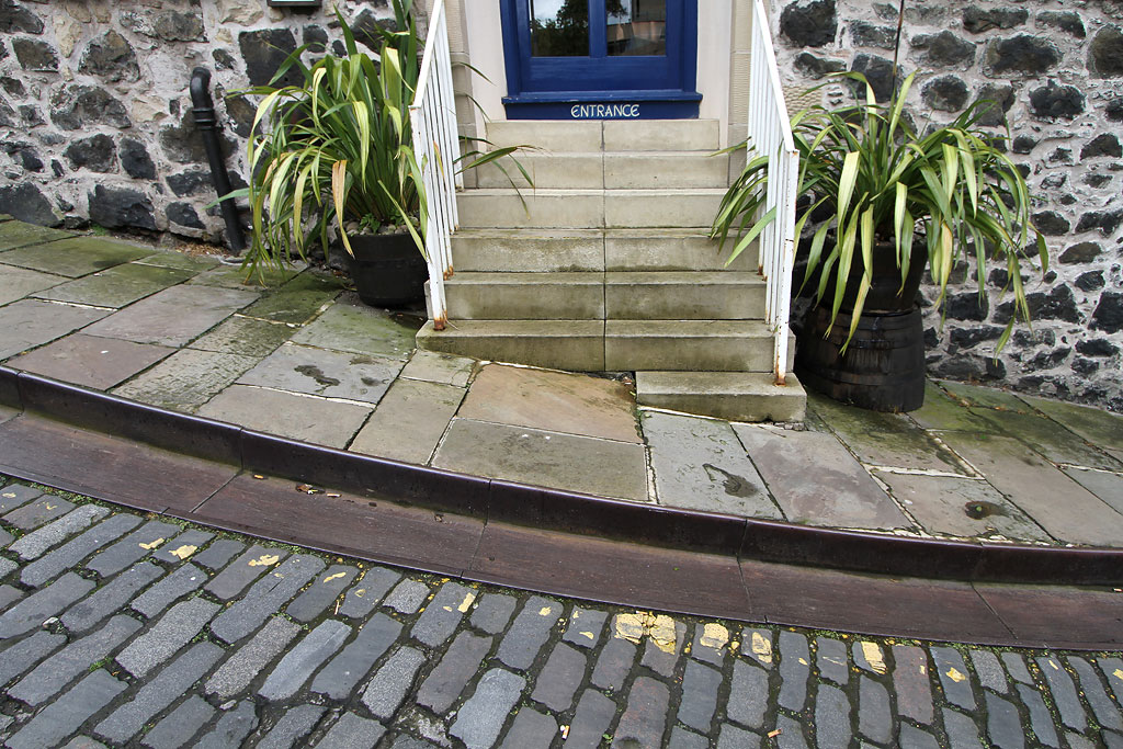 Metal Gutter and Drain at the edge of Calton Hill, the steep street leading up from Leith Street to Regent Road